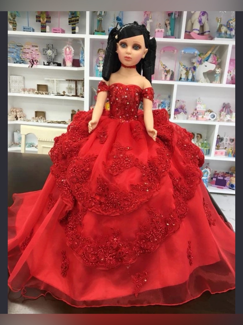 24-inch Quinceañera Keepsake Doll Wearing A Layered, sparkly Red Gown.